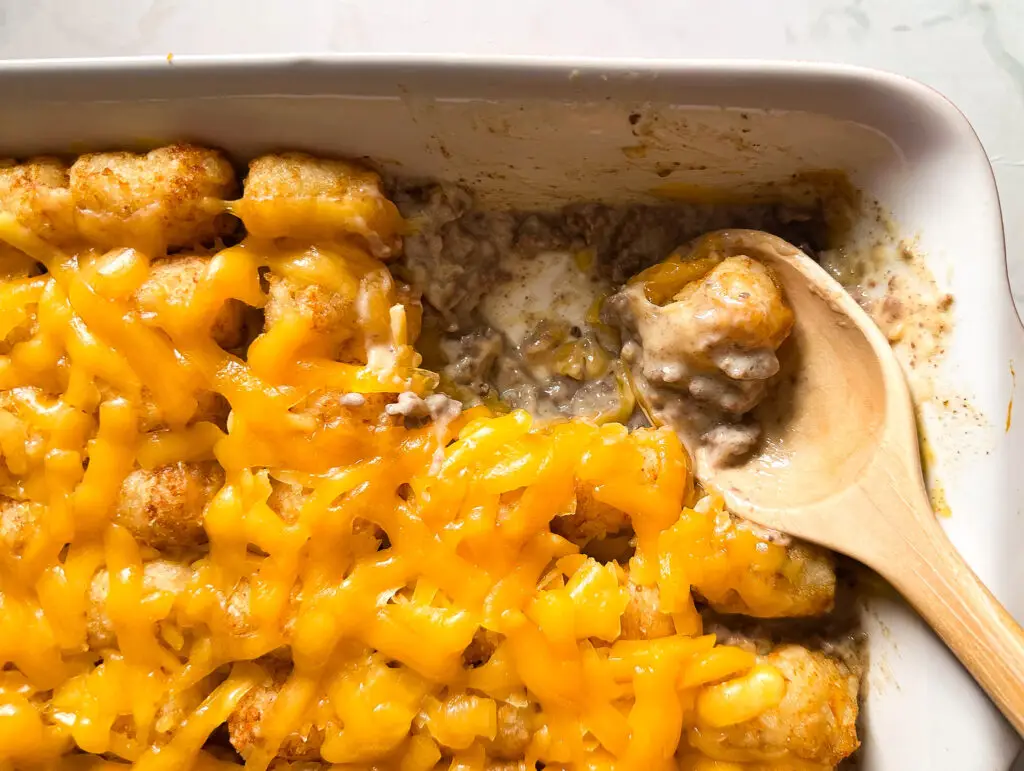 Easy ground beef tater tot casserole baked with cheddar cheese and crispy tater tots