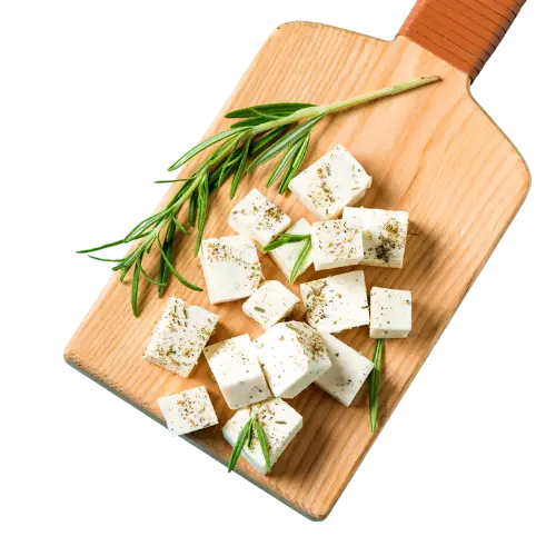 Feta cheese recipes for Greek salad, Mediterranean bowls, shawarma, and salty crumbled finishes. Featuring Greek chicken souvlaki