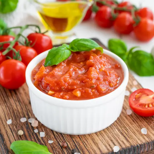 Marinara sauce recipes for baked pasta, chicken parmesan, and Italian-American dinners, featuring baked ziti with ground beef, baked chicken parmesan, and pizza roll ups