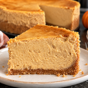 pumpkin cheesecake recipe- Pumpkin Cheesecake Recipe Creamy pumpkin cheesecake slice with a buttery graham cracker crust and rich pumpkin spice filling.